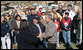 President George W. Bush holds the hands of Phil and June Spears after touring their Lafayette, Tennessee neighborhood Friday, Feb. 8, 2008. The President assured the Spears that they'd receive the care they needed in the wake of Tuesday's deadly tornadoes, and said, "And you're going to find you got some new friends showing up, too. When they know there's a neighbor in need, they'll come and help you." White House photo by Chris Greenberg