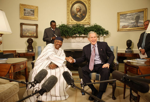 President George W. Bush and Mali President Amadou Touré meet in the Oval Office Tuesday, Feb. 12, 2008, at the White House. Said President Bush upon welcoming his fellow leader, "I was touched by the President's concern about the life of the average citizen in Mali. This is a country that's committed to the rights of its people, and we're proud to be standing side-by-side with you." White House photo by Eric Draper