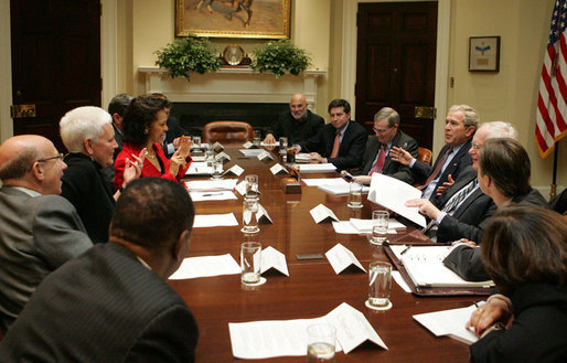 President George W. Bush attends the National Security Advisor's meeting with the Helping to Enhance the Livelihood of People around the Globe (H.E.L.P.) Commission Tuesday, Feb. 12, 2008, in the Roosevelt Room at the White House. The H.E.L.P. Commission reviews foreign assistance and provides recommendations to the President and Congress. White House photo by Joyce N. Boghosian