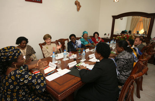 Mrs. Laura Bush participates in a roundtable discussion with faith-based HIV/AIDS Prevention Program graduates Sunday, Feb. 17, 2008, at Karimjee Hall in Dar es Salaam, Tanzania. Mrs. Bush reconfirmed America’s commitment to the Tanzanian people and their continued efforts against HIV/AIDS. At left is Mrs. Salma Kikwete, First Lady of Tanzania. White House photo by Shealah Craighead