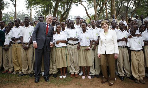 President George W. Bush and Mrs. Laura Bush pose for a photo with the Lycee de Kigali students Tuesday, Feb. 19, 2008 in Kigali, Rwanda. White House photo by Eric Draper