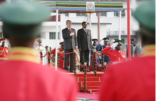 President George W. Bush stands with Tanzania President Jakaya Kikwete during farewell ceremonies Tuesday, Feb. 19, 2008, at the Julius Nyerere International Airport in Dar es Salaam, Tanzania. White House photo by Chris Greenberg