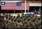 President George W. Bush and Liberian President Ellen Johnson Sirleaf review Liberian troops Thursday, Feb. 21, 2008, during President Bush’s visit to the Barclay Training Center in Monvoria, Liberia. White House photo by Shealah Craighead