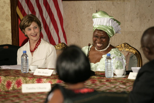 Mrs. Laura Bush participates in a roundtable discussion Thursday, February 21, 2008, in Monrovia, Liberia, with Karyumu Boakai, Spouse of Vice President Joseph Boakai, and local adults who have been faced with and persevered in working with Liberian youth who have been affected by the war. White House photo by Shealah Craighead