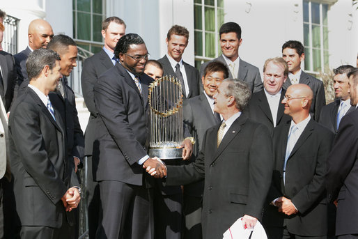 President Bush shakes hands with Boston Red Sox David Ortiz during a ceremony honoring the 2007 World Series Champion Boston Red Sox, Wednesday, Feb. 27, 2008, on the South Lawn of the White House. White House photo by Chris Greenberg