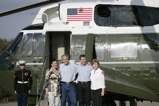 President George W. Bush and Mrs. Laura Bush are joined by Prime Minister Anders Fogh Rasmussen of Denmark and Mrs. Anne-Mette Rasmussen after the Danish first couple's arrival Friday, Feb. 29, 2008, to the Bush Ranch in Crawford, Texas. White House photo by Shealah Craighead