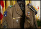 The Korean era U.S. Army jacket of Master Sgt. Woodrow Wilson Keeble is seen Monday, March 3, 2008, displayed in the East Room of the White House, during the presentation of the Medal of Honor, posthumously, in honor of Master Sgt. Keeble’s gallantry during his service in the Korean War. Keeble is the first full-blooded Sioux Indian to receive the Medal of Honor. White House photo by Eric Draper