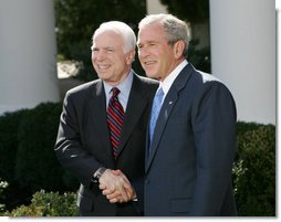 President George W. Bush and Senator John McCain (R-Ariz.) shake hands as they deliver a statement Wednesday, March 5, 2008, in the Rose Garden of the White House. Said the President in his endorsement of Senator McCain, "John showed incredible courage and strength of character and perseverance in order to get to this moment. And that's exactly what we need in a President."  White House photo by Chris Greenberg