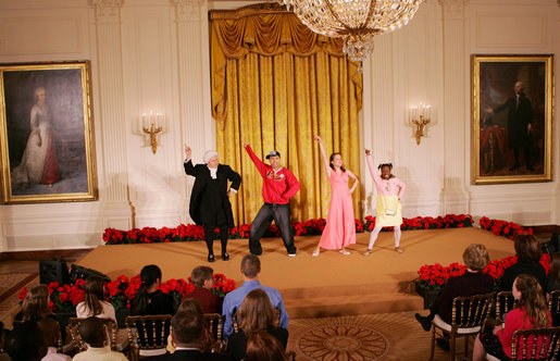 Mrs. Laura Bush, along with invited guests, watches a scene performance Friday, March 7, 2008 in the East Room of the White House, from the theater production of Chasing George Washington: A White House Adventure. The play is part of the Kennedy Center Performances for Young Audiences Series. White House photo by Joyce N. Boghosian