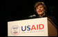 Mrs. Laura Bush delivers remarks Friday, March 7, 2008, during the USAID Celebration of International Women's Day at the Ronald Reagan Building in Washington, D.C. Mrs. Bush told her audience, "We're here today to tell our sisters around the world that we want them to join us. We're here to tell them that the long walk to freedom and equality, even though sometimes it might be a tiresome journey, that it's worth it. And the women of the United States are with them every single step of the way." White House photo by Joyce N. Boghosian