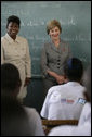 Mrs. Laura Bush visits students enrolled in the IDEJEN educational program at the College de St. Martin Tours Thursday, March 13, 2008, in Port-au-Prince, Haiti. Speaking to the program’s faculty and staff Mrs. Bush said, “Educating its young people is one of the best things a country can do to ensure its continued development.” White House photo by Shealah Craighead