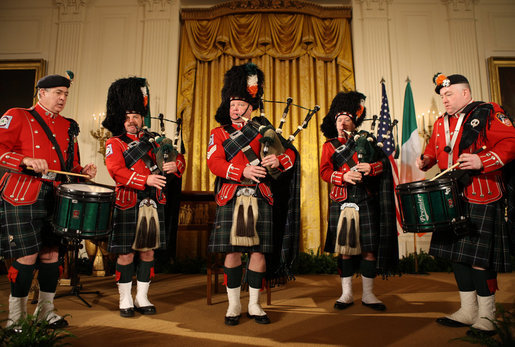 Pipers from the FDNY Emerald Society Pipes and Drums perform in the East Room Monday, March 17, 2008, during a St. Patrick's Day reception at the White House. White House photo by Shealah Craighead