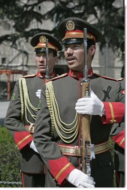 Members of an Afghanistan military honor guard sing their national anthem Thursday, March 20, 2008 during a ceremony in honor of the arrival of Vice President Dick Cheney. The Vice President’s visit to Kabul comes at a critical time as allied members of NATO consider their future commitments to the young democracy’s development. White House photo by David Bohrer