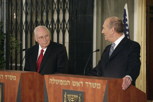 Vice President Dick Cheney looks on as Prime Minister of Israel Ehud Olmert delivers a statement Saturday, March 22, 2008 during a press availability at the prime minister's residence in Jerusalem. The Vice President is scheduled to meet with both Israeli and Palestinian leadership over Easter weekend to discuss President Bush's commitment to a two state solution for Israeli-Palestinian peace. White House photo by David Bohrer