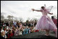 Children gather at the Magic Stage on the South Lawn of the White House to watch magician Fairy Twinkletoes perform Monday, March 24, 2008, during the 2008 White House Easter Egg Roll. White House photo by Grant Miller