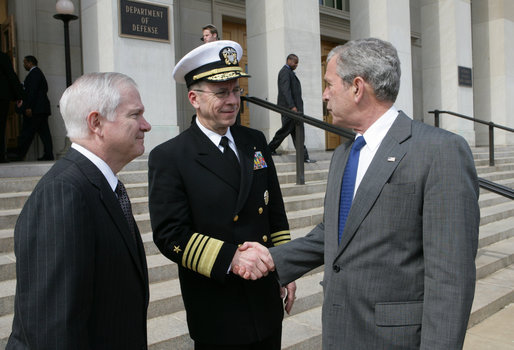 President George W. Bush shakes hands with Joint Chiefs of Staff Chairman Admiral Michael Mullen, and accompanied by U.S. Defense Secretary Robert Gates, as he departs the Pentagon Wednesday, March 26, 2008, following a briefing at the U.S. Department of Defense in Arlington, Va. White House photo by Chris Greenberg