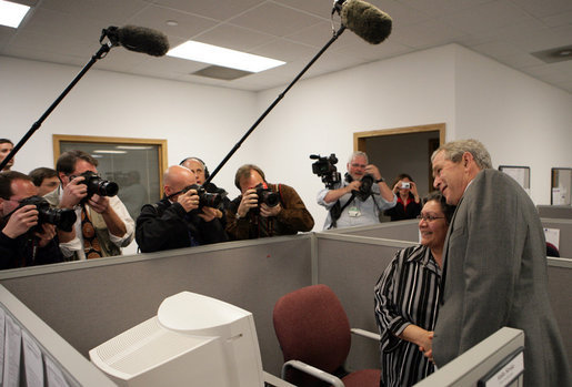 President George W. Bush greets employees prior to making remarks Friday, March 28, 2008, at Novadebt in Freehold, New Jersey. White House photo by Chris Greenberg