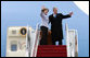 President George W. Bush and Mrs. Laura Bush wave as they board Air Force One Monday, March 31, 2008, for departure to Kyiv, Ukraine, the first stop on their European visit that will include the NATO Summit in Bucharest. White House photo by Chris Greenberg