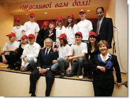 President George W. Bush and Mrs. Laura Bush pose with students from School 57 in Kyiv Tuesday, April 1, 2008, after the Ukrainian teens performed a skit sponsored by PEPFAR, the President's Emergency Plan for AIDS Relief.  White House photo by Shealah Craighead