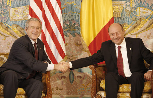 President George W. Bush and President Traian Basescu of Romania, exchange handshakes during their meeting Wednesday, April 2, 2008, in Neptun, Romania. White House photo by Eric Draper