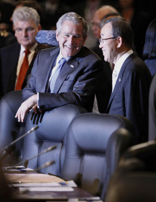 President George W. Bush speaks with United Nations Secretary-General Ban Ki-moon Thursday, April 3, 2008, during the 2008 NATO Summit in Bucharest. White House photo by Eric Draper