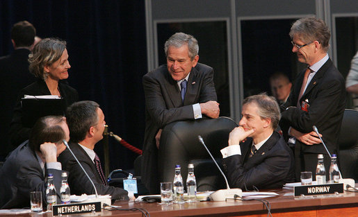 President George W. Bush shares a light moment with Norway’s Prime Minister Jens Stoltenberg, left, and Foreign Minister Jonas Gahr Store, right, during the NATO Summit Thursday, April 3, 2008, in Bucharest. White House photo by Chris Greenberg
