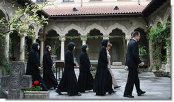 Mrs. Laura Bush and Sisters of the Stavropoleos Monastery in Bucharest, follow Dr. Petre Radu Guran as he leads them across the church courtyard Friday, April 4, 2008. In 2003, the U.S. Embassy donated $27,000 for the restoration of the courtyard under the auspices of a special U.S. Department of State program entitled, “Ambassador’s Fund for Cultural Preservation. White House photo by Shealah Craighead