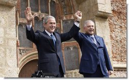 President George W. Bush and Prime Minister Ivo Sanader of Croatia, raise hands together before thousands who flocked to St. Mark's Square in downtown Zagreb Saturday, April 5, 2008, to see and hear the U.S. President.  White House photo by Eric Draper
