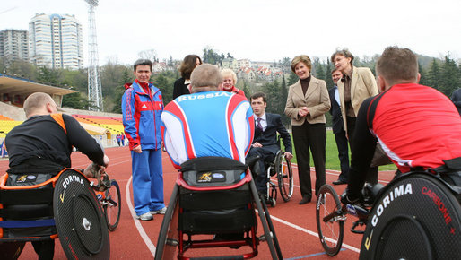 Mrs. Laura Bush visits with members of the Russian Paralympic Team Sunday, April 6, 2008, during a visit to Central Sochi Stadium in Sochi, Russia. White House photo by Shealah Craighead