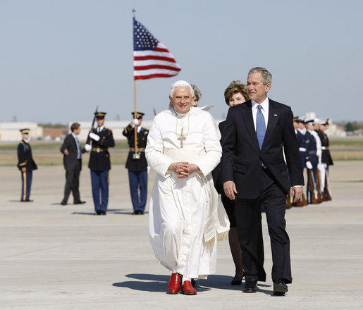 President George W. Bush, Mrs. Laura Bush and daughter, Jenna Bush, walk with Pope Benedict XVI after the Pontiff's arrival Tuesday, April 15, 2008, at Andrews Air Force Base, Maryland. White House photo by Eric Draper