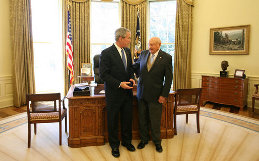 President George W. Bush stands with Truett Cathy, Founder, President and CEO of Chick-fil-A and Founder of the WinShape Foundation, after he presented Mr. Cathy with the Lifetime President's Volunteer Service Award at the White House. White House photo by Joyce N. Boghosian