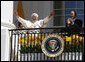 President George W. Bush and Laura Bush applaud as Pope Benedict XVI acknowledges being sung happy birthday by the thousands of guests Wednesday, April 16, 2008, at his welcoming ceremony on the South Lawn of the White House. White House photo by Eric Draper