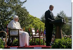 President George W. Bush delivers remarks Wednesday, April 16, 2008, during the arrival ceremony for Pope Benedict XVI on the South Lawn of the White House. Said the President, "Holy Father, thank you for making this journey to America. Our nation welcomes you. We appreciate the example you set for the world, and we ask that you always keep us in your prayers."  White House photo by David Bohrer