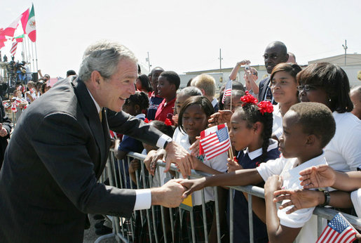 President George W. Bush shakes hands with students from New Orleans area schools upon his arrival to Louis Armstrong New Orleans International Airport Monday, April 21, 2008, where President Bush will attend the 2008 North American Leaders’ Summit. White House photo by Joyce N. Boghosian