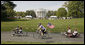 Members of the Wounded Warrior Project's Soldier Ride head around the South Lawn of the White House Thursday, April 24, 2008, during the kickoff of the annual "Soldier Ride: White House to Lighthouse Challenge" bike ride. White House photo by Joyce N. Boghosian