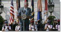 President George W. Bush smiles as he delivers remarks to the Members of the Wounded Warrior Project's Soldier Ride Thursday, April 24, 2008, on the South Lawn of the White House. The ride provides rehabilitative cycling events for severely injured service members, affording many of the combat-wounded veterans a way to return to an active lifestyle.  White House photo by Patrick Tierney