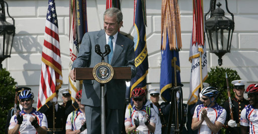 President George W. Bush smiles as he delivers remarks to the Members of the Wounded Warrior Project's Soldier Ride Thursday, April 24, 2008, on the South Lawn of the White House. The ride provides rehabilitative cycling events for severely injured service members, affording many of the combat-wounded veterans a way to return to an active lifestyle. White House photo by Patrick Tierney