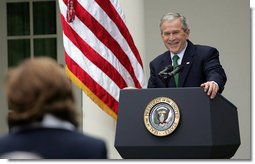 President George W. Bush laughs as he takes a question from a journalist Tuesday, April 29, 2008, during a news conference in the Rose Garden of the White House.  White House photo by Shealah Craighead