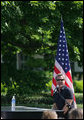 Country recording artist Phil Vassar sings the national anthem Tuesday, May 6, 2008, during Military Spouse Day celebration on the South Lawn of the White House. White House photo by Chris Greenberg