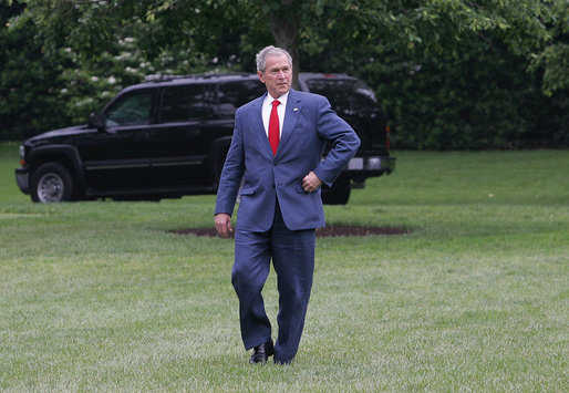 President George W. Bush practices his walk down the aisle with daughter Jenna as he moves across the South Lawn Thursday, May 8, 2008, for a Marine One departure en route to Andrews Air Force Base continuing on to Texas, where he and Mrs. Laura Bush will celebrate the wedding of Jenna and fiance Henry Hager. White House photo by Joyce N. Boghosian