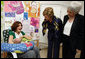 Mrs. Laura Bush and Mrs. Aliza Olmert, spouse of Israel’s Prime Minister Ehud Olmert, greet a young mother in the Breast Feeding Education Room during a visit to the Tipat Chalav-Gonenim Neighborhood Mother and Child Care Center in Jerusalem Wednesday, May 14, 2008. There are 30 similar centers throughout the city providing prenatal, postnatal and preventative care and advice on breastfeeding, nutrition, immunizations and disease screening. White House photo by Shealah Craighead