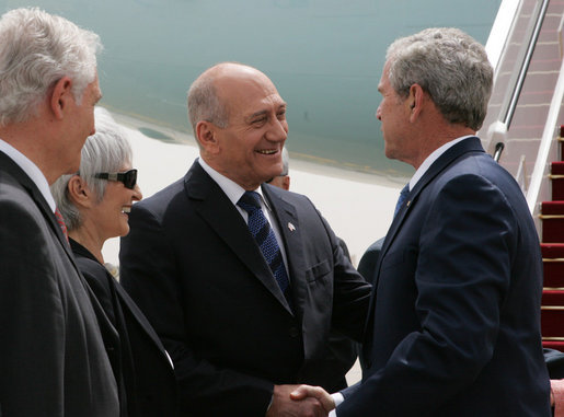 President George W. Bush is greeted by Israel’s Prime Minister Ehud Olmert and Mrs. Aliza Olmert as he deplanes Air Force One Wednesday, May 14, 2008, with Mrs. Laura Bush in Tel Aviv. The President and First Lady will spend two nights in Jerusalem before continuing on to Saudi Arabia and Egypt. White House photo by Joyce N. Boghosian