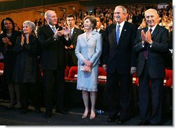 President George W. Bush and Laura Bush are applauded as they attend the Israeli Presidential Conference 2008 at the Jerusalem International Center in Jerusalem, Wednesday, May 14, 2008, during a celebration in honor of the nation's 60th anniversary. From left are U.S. Secretary of State Condoleezza Rice, Mrs. Aliza Olmert, Israeli Prime Minister Ehud Olmert, and Israeli President Shimon Peres. White House photo by Joyce N. Boghosian