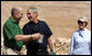 President George W. Bush and Prime Minister Ehud Olmert of Israel, share a moment as they stop during their tour of Masada with Mrs. Laura Bush to learn about the historic fortress’s water system. White House photo by Joyce N. Boghosian