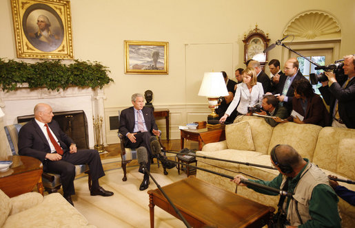 President George W. Bush is joined by U.S. Treasury Secretary Henry Paulson Monday morning, May 19, 2008, in the Oval Office, where President Bush told reporters he looks forward to working with Congress to get a good piece of legislation to help creditworthy people to stay in their homes. White House photo by Eric Draper