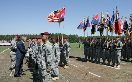 President George W. Bush presents medals to members of the 82nd Airborne Division, Thursday, May 22, 2008, during ceremonies at the 82nd Airborne Division Review in Fort Bragg, N.C. White House photo by Chris Greenberg