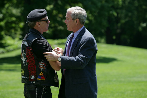 President George W. Bush greets Artie Muller, the National Executive Director of Rolling Thunder on the South Lawn of the White House. White House photo by Chris Greenberg