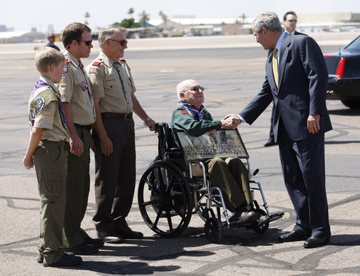 President George W. Bush greets four generations of Eagle Scouts, from right, Tom Boggess Jr., Tom Boggess III, Tom Boggess IV, and Tom Boggess V after arriving in Phoenix, Arizona, Tuesday, May 27, 2008. White House photo by Eric Draper