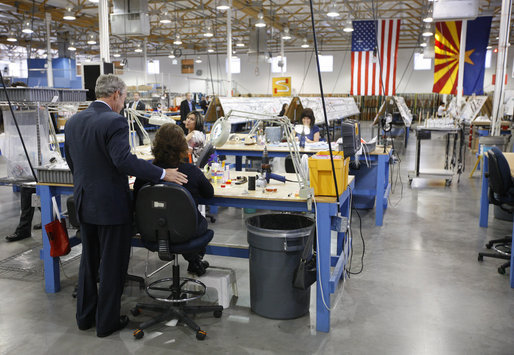 President George W. Bush visits with employees on the production floor of the Silverado Cable Company in Mesa, Arizona, Tuesday, May 27, 2008. White House photo by Eric Draper