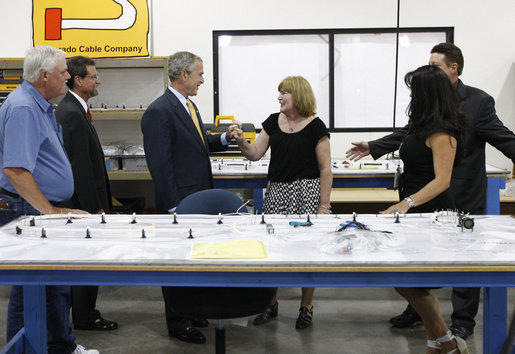 President George W. Bush greets employees while touring the production floor at the Silverado Cable Company in Mesa, Arizona, Tuesday, May 27, 2008. White House photo by Eric Draper